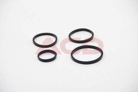 Прокладка масляного радіатора Berlingo/Partner 1.6 HDi 10-/Nemo 1.4 HDi 08- (комплект) BSG BSG 30-116-001